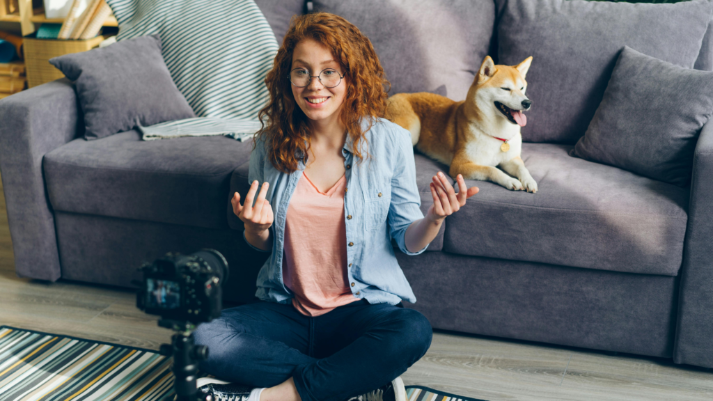 Smiling Woman Sitting in front of Camera